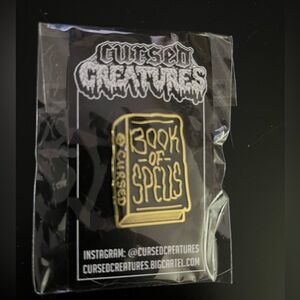 Cursed Creatures Book of Spells pin